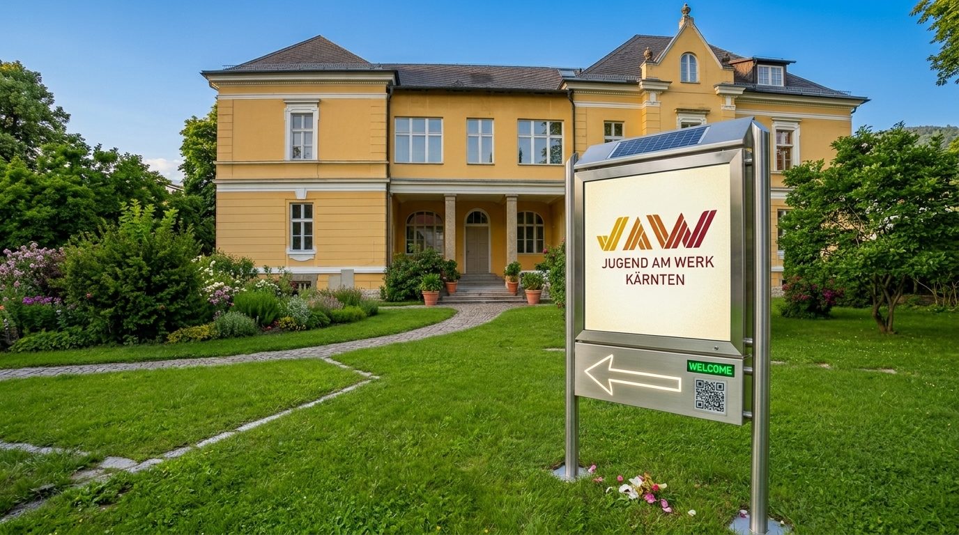 Gebäude von Jugend am Werk mit Hinweistafel im Garten
